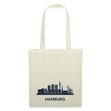 Lataa kuva Galleria-katseluun, Naturfarbener Stoffbeutel mit Hamburg-Skyline und Schriftzug HAMBURG in Marineblau
